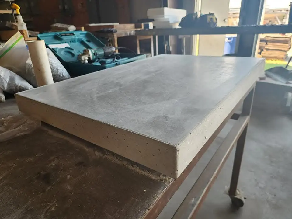 Finished custom concrete countertop with a clean thick edge