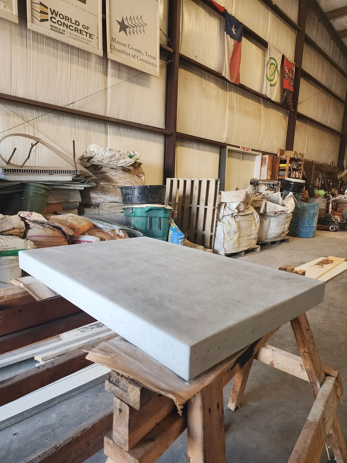 Concrete countertop being completed in the Zach Rabon Concrete shop